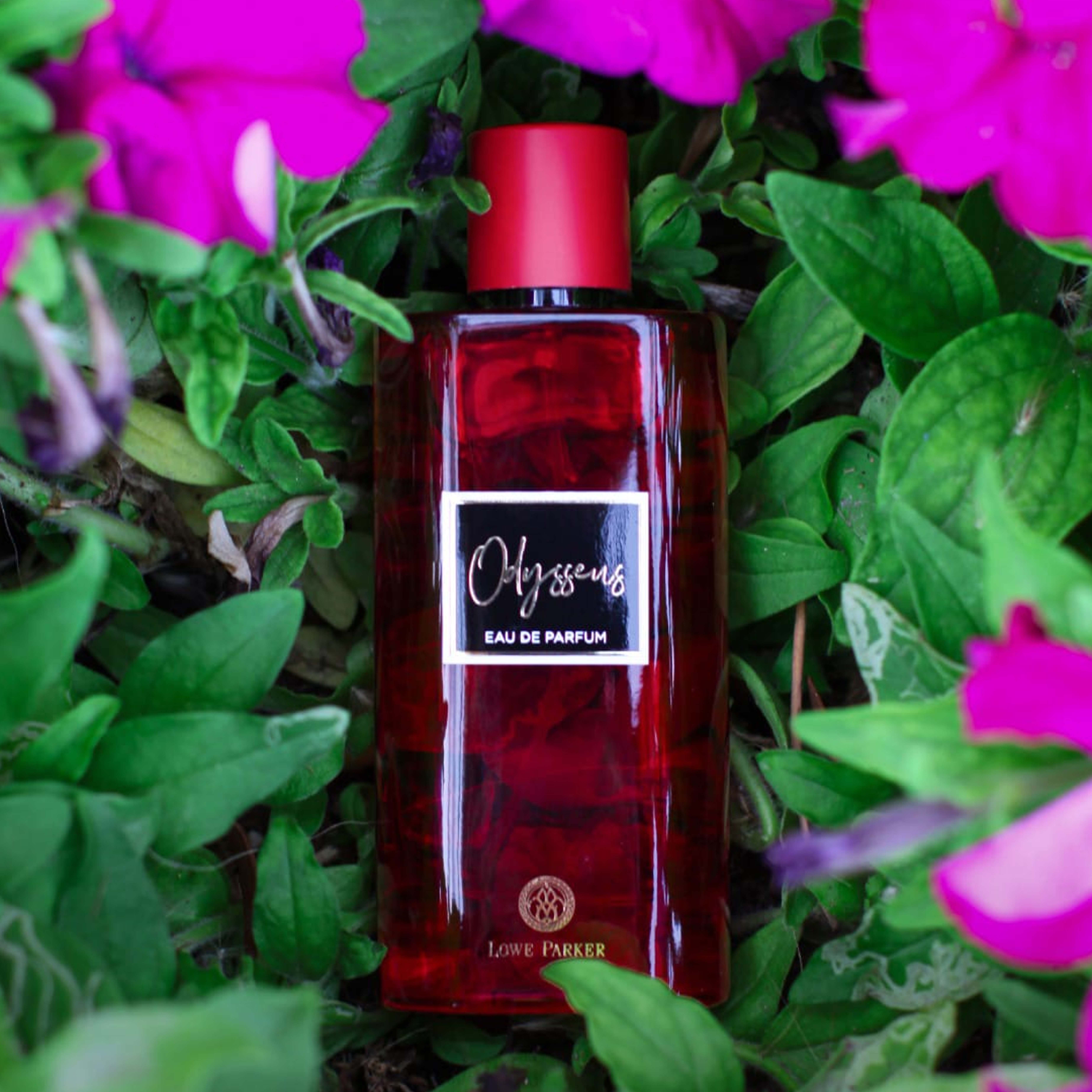 Woman confidently wearing bespoke citrus-amber signature scent, Luxury unboxing experience of limited-edition fragrance.