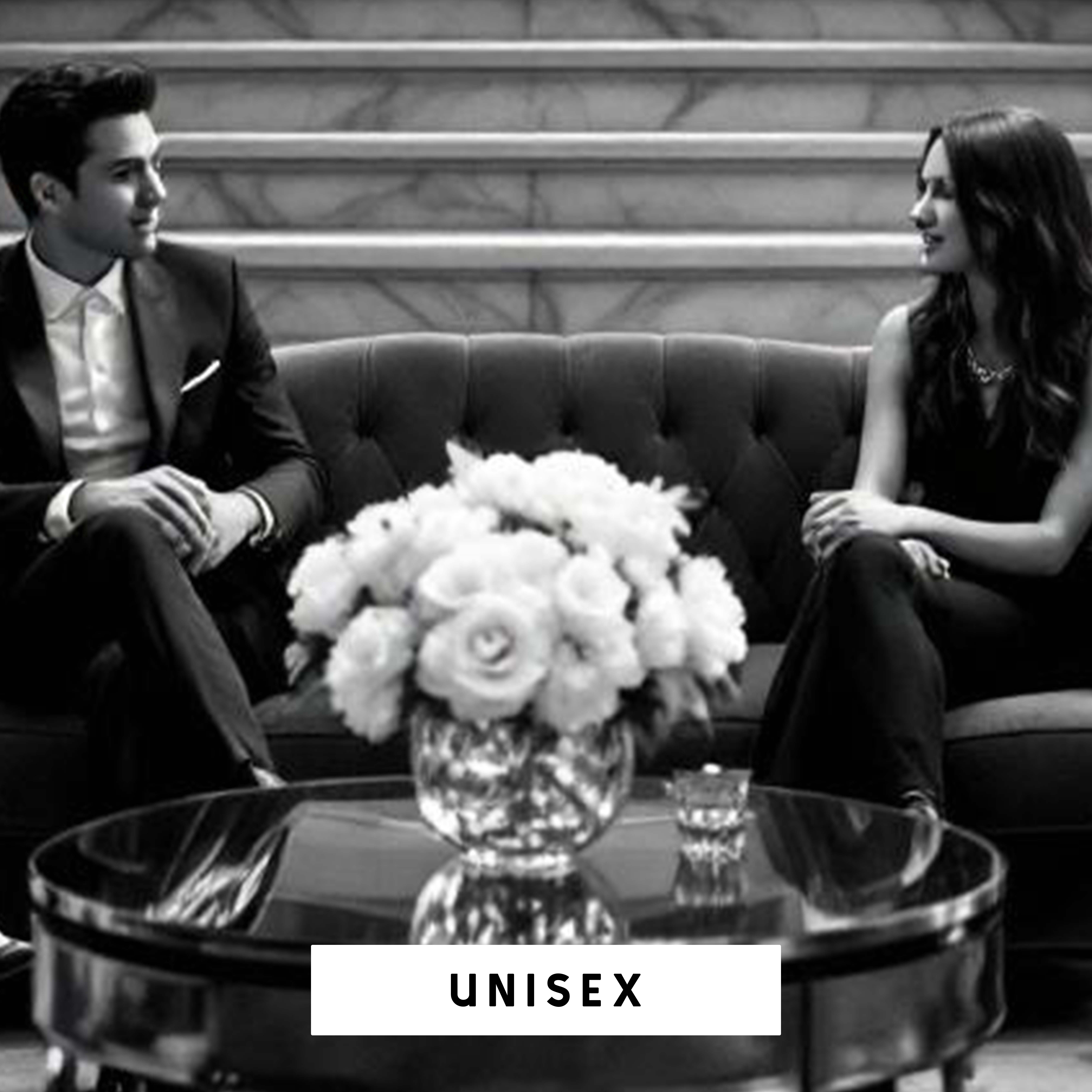 Woman confidently wearing bespoke citrus-amber signature scent, Luxury unboxing experience of limited-edition fragrance.